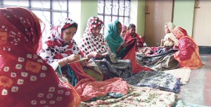 A typical adda of Kantha workers.