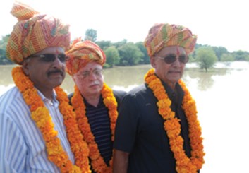 From Right: PRIP Kalyan Banerjee, TRF Trustee Sushil Gupta and PDG Ashok Gupta at the inauguration of a check dam built by Rotary in a Rajasthan village.