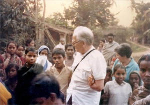 Dr Peter Berghaus with the beneficiaries in a village - 1978.