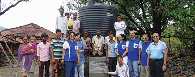 Rotarians with the villagers at the inauguration of the water tank.