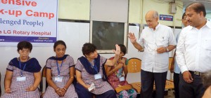 PRIP Kalyan Banerjee and RC Vapi President Jayesh Kansara share a warm moment with mentally challenged children at the Haria Rotary Hospital.