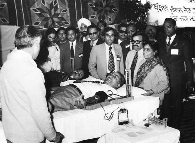 Rtn Brijmohan Lall Munjal donating blood at a Rotary Conference in 1973.