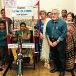 Past president Yezdi Batliwala and his wife Pooroochi sponsor a tricycle shop to Gitanjali Salunkhe in memory of their daughter Sharmin.