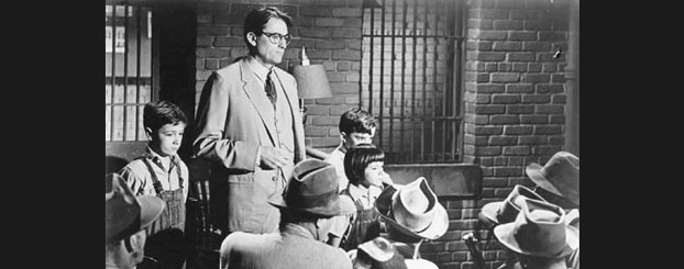 Gregory Peck playing the role of Atticus Finch in the film To kill a Mockingbird.