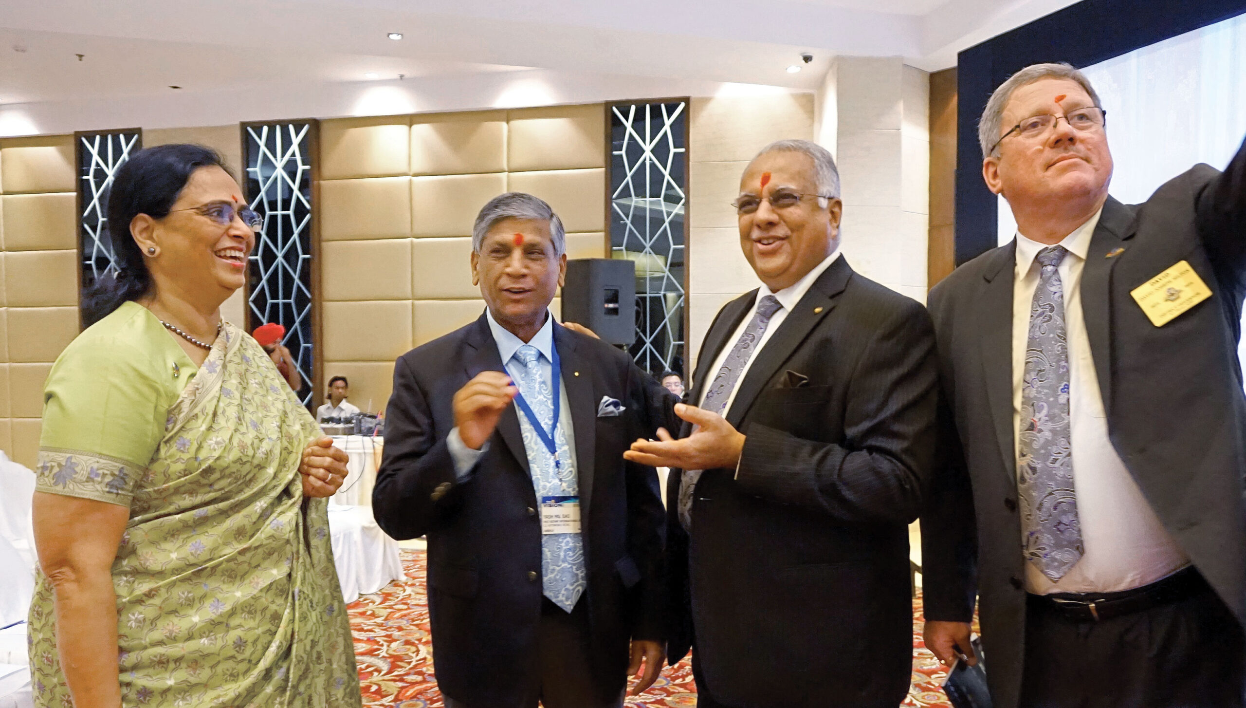 From left: Sharmishtha Desai, PRID Yash Pal Das, RI Director Manoj Desai and DG David Hilton.
