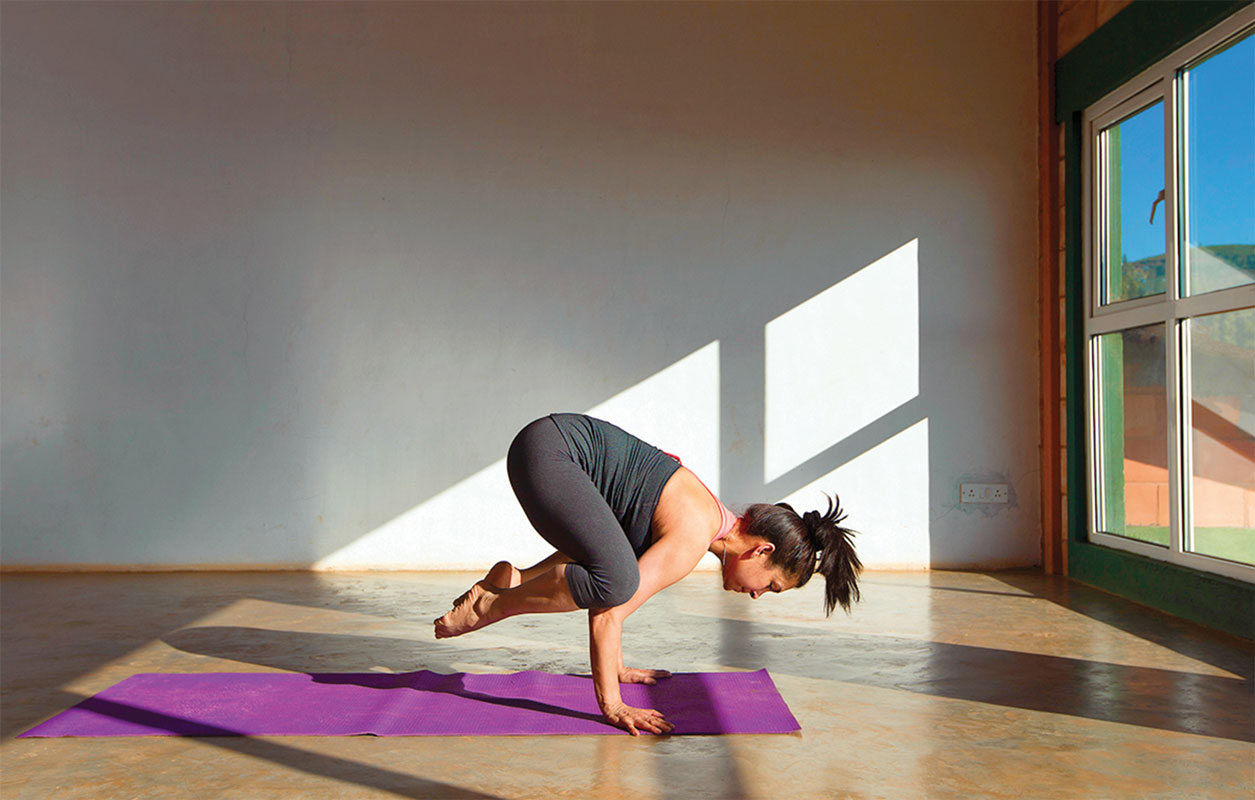 The writer performing yoga practice.