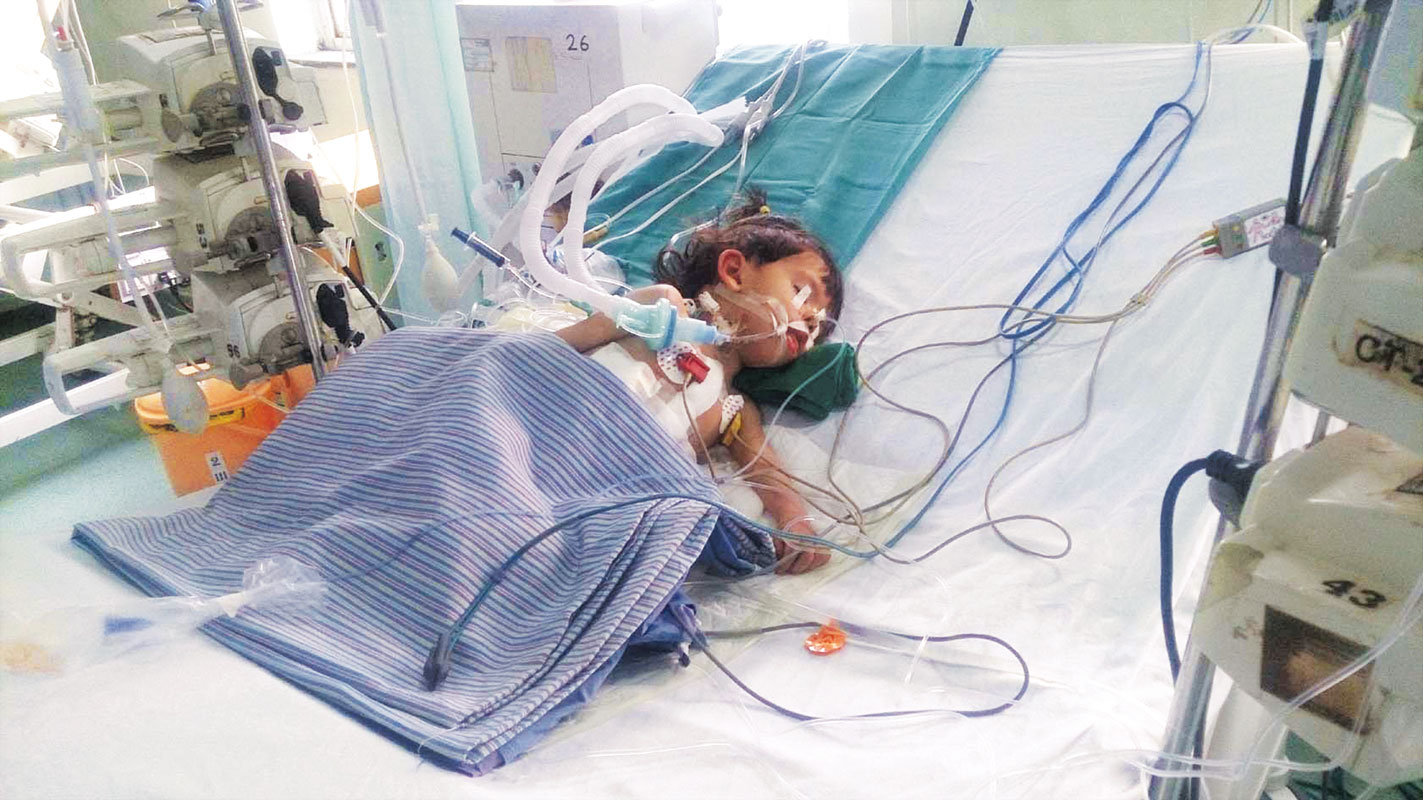 Afghan baby Aisha battles for her life.