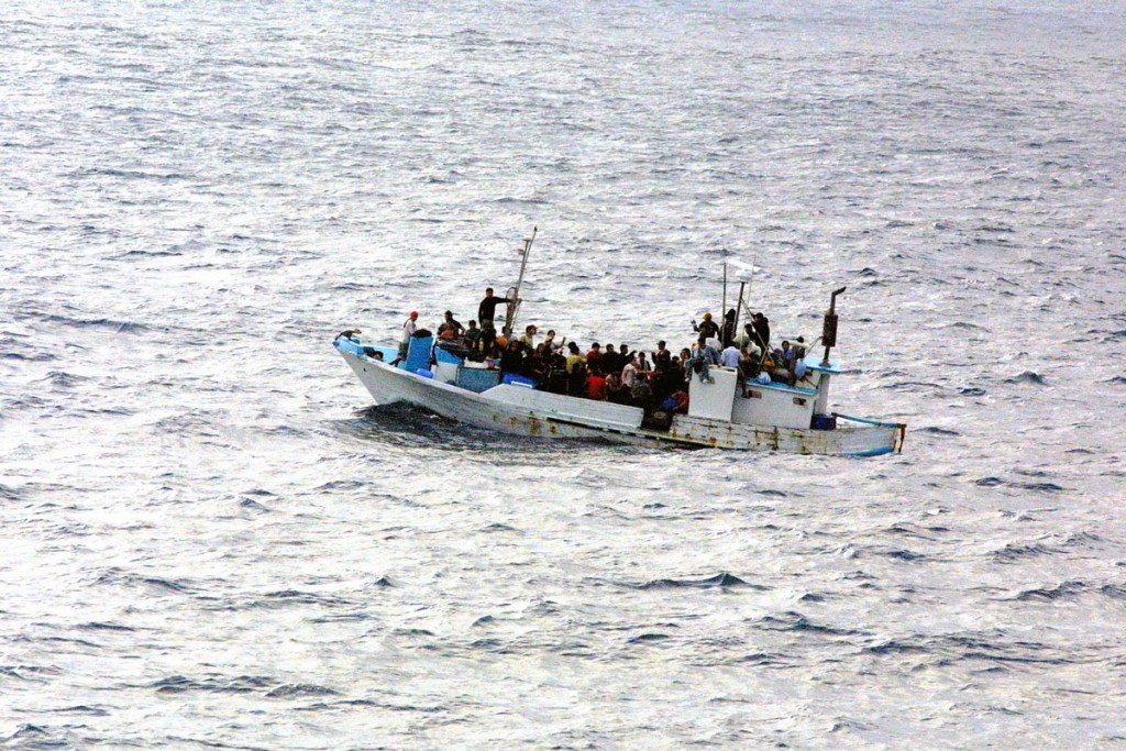 Refugees on a boat.