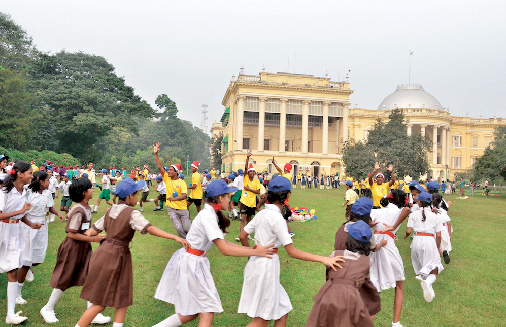 Children from welfare schools running around the Raj Bhavan campus.