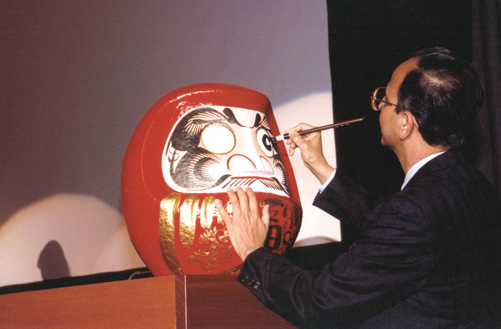 Painting one eye of the Daruma doll at the UN.