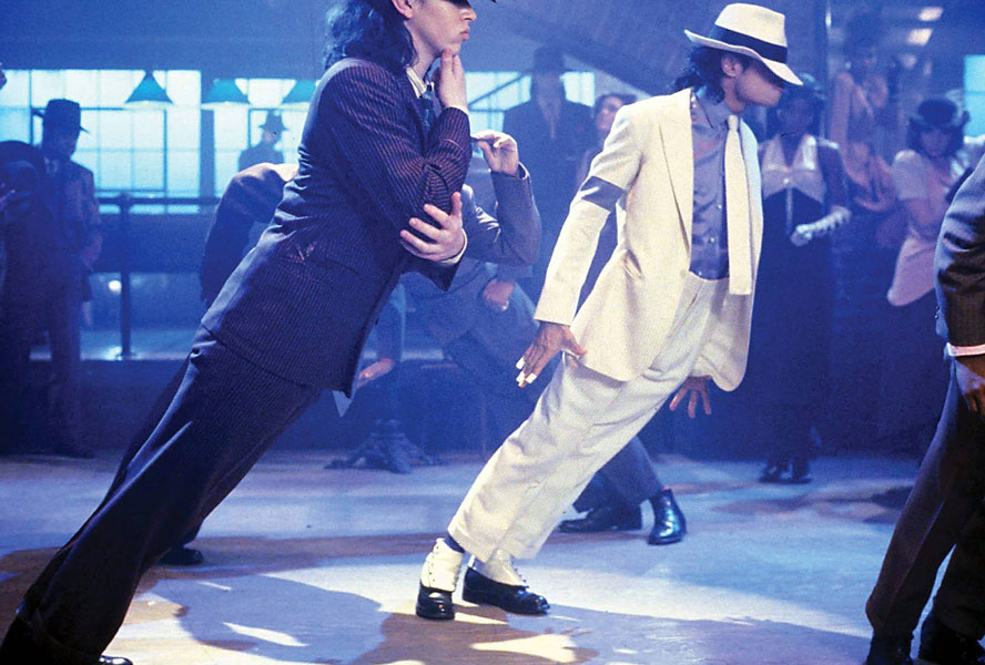 Smooth Criminal Ever since Michael Jackson performed the ­infamous gravity-defying lean in his ­­Smooth Criminal, several fans had tried and failed to copy the move. But the mystery is out now! He, along with two others, had invented and patented a special shoe that had a slotted heel which slid onto bolts that protruded from the floor, thus creating a dovetail joint between the dancer and the stage. While strings were used in the music video, MJ had to get creative on the road, and these shoes helped him and his team to lean over at a 45 deg angle to the floor.