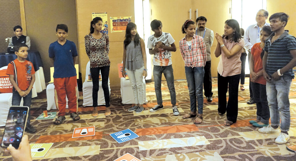 Children enact a short skit to explain WinS.