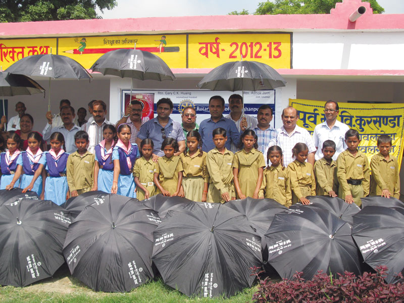 RC Shajahanpur City RI District 3110 Umbrellas were donated to 150 underprivileged students of Purva Madhyamik Vidhyalaya at Kursanda village. 