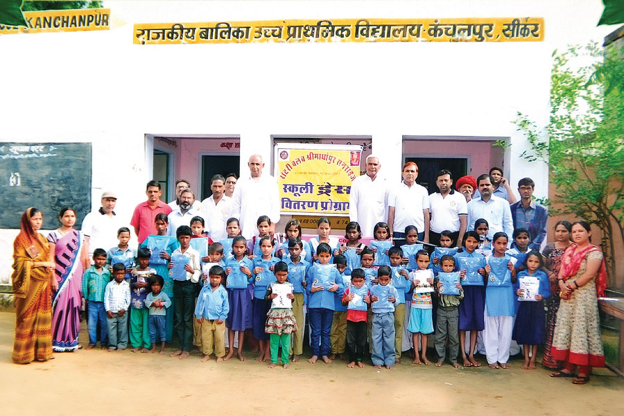 RC Srimadhopur Sunrise RI District 3052 School uniforms donated to 250 poor students from various government schools to promote literacy. 
