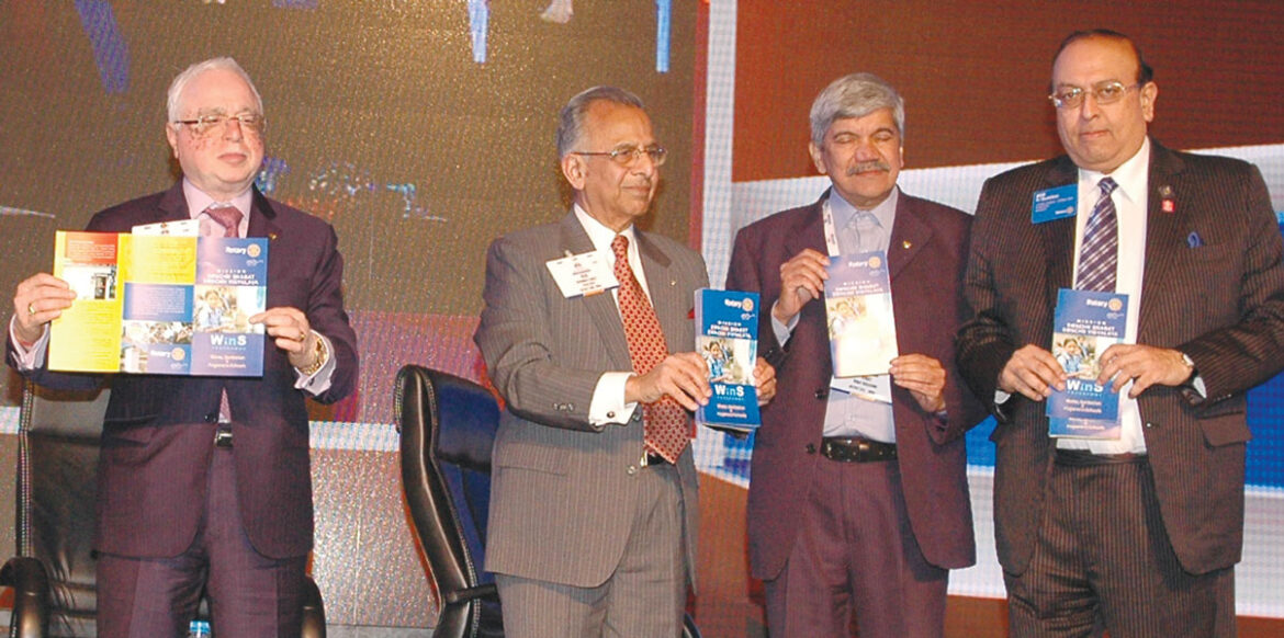 L to R: TRF Trustee Sushil Gupta, PRIP Rajendra K Saboo, PDG Vinay Kulkarni and RID P T Prabhakar releasing the WinS brochure.