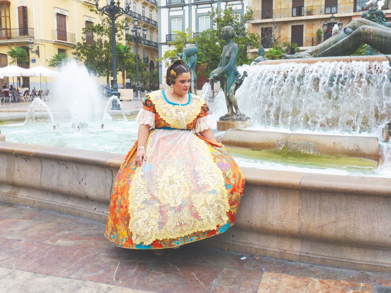 A Spanish woman in a traditional dress.