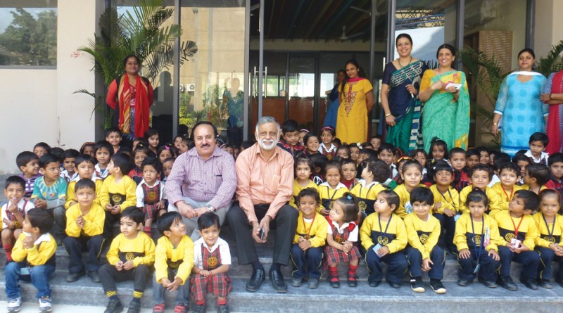 PDG Sushil Khurana and Rtn O P Pahwa along with the staff and children of the school.