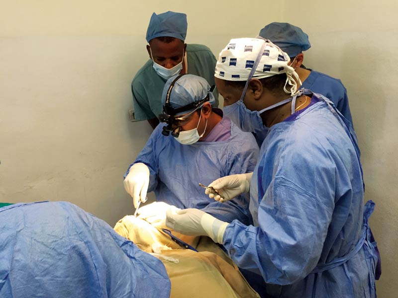 A surgery in progress and a learning process for the African doctors.