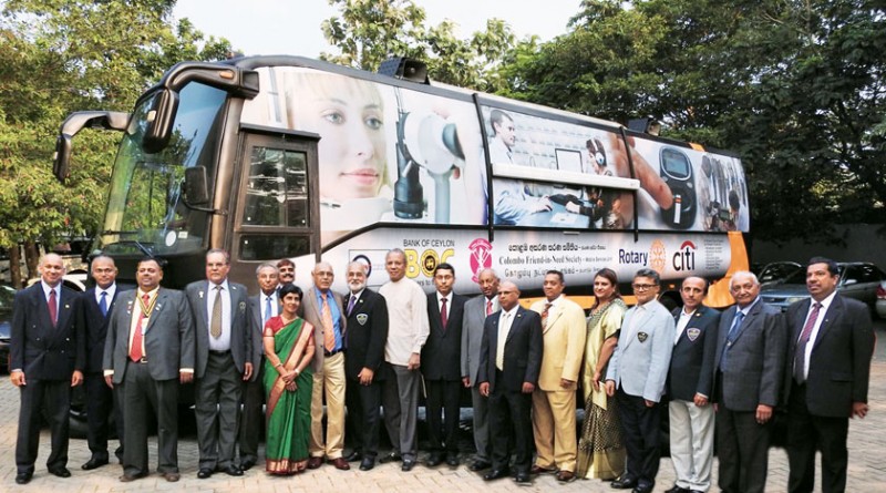 PP of RC Bombay Airport Kevin Colaco, IPRIP K R Ravindran, Deputy High Commissioner in Sri Lanka Arindam Bagchi and D 3220 Governor Senaka Amerasinghe, along with other Rotarians, at the launch of the healthcare bus.