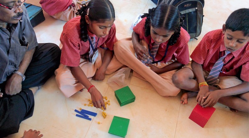 No more math-phobia for these children who experiment arithmetical operations with the Akshara Math programme.