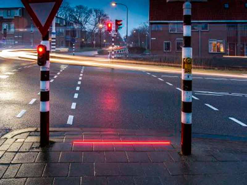 Pavement lights for smartphone addicts Bodegraven, a Dutch town is trialling a traffic light system specially aimed at smartphone addicts. A series of LED lights in red and green, embedded into the pavement at pedestrian crossings, alert pedestrians addicted to their smartphones either on social media or mobile gaming, on when to cross the road and when to stop, depending upon the traffic signal. Though it serves to reduce traffic accidents, the system, called +Lichtlijn, has attracted criticism from a Dutch road safety organisation claiming it “rewards bad behaviour.” If this pilot proves successful, more will be rolled out across Netherlands. Similar pavement lights are being tested in the German city of Augsburg too.