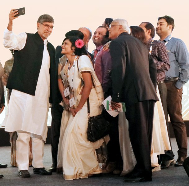 Nobel Peace Laureate Kailash Satyarthi takes a selfie with RILM staff and RILM Secretary Aniruddha Roy Chowdhury.
