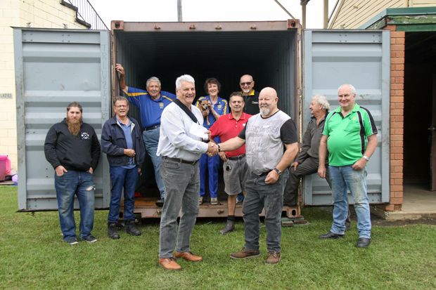 COMMUNITY KINDNESS: Rotary Club of Lismore president Neil Woods (on left) presented Lismore Men's & Community Shed president George Sparnon with a 20ft shipping container and a $1000 voucher for Summerland Tools.