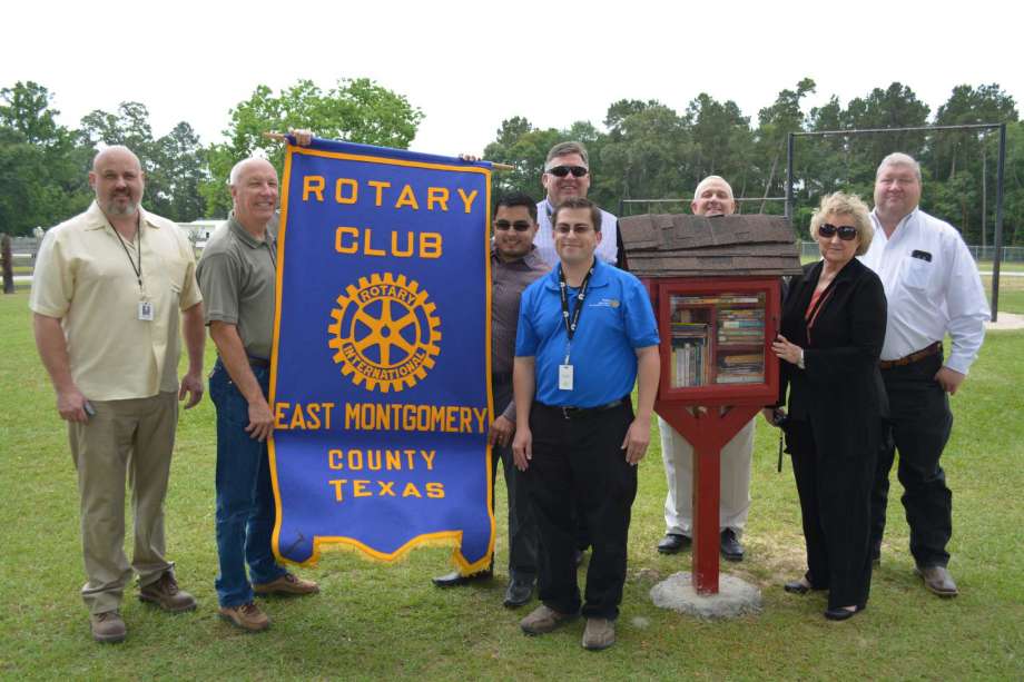 The first Rotary Club EMC Free Library was unveiled at Bull Sallas Park in New Caney, Texas. From left to right are Porter High School teacher Robert Barham, Rob Burgess, Jose Diosado, NCISD Superintendent Kenn Franklin, Rotary Club President Melecio Franco, Scott Castleberry, Barbara Knox and Montgomery County (precinct 4) Commissioner Jim Clark.
