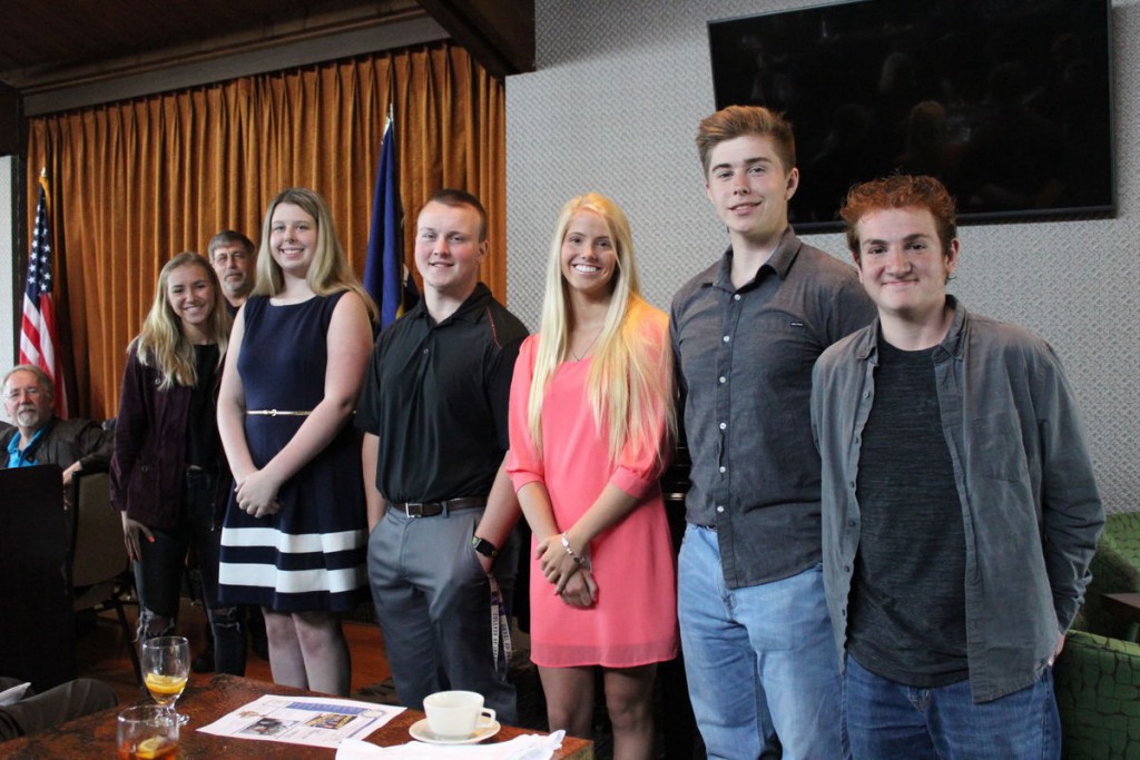 Posing for a group photo during the Rotary club lunch are from left, Taft 7-12 High School seniors Sarah Davis, Janelle, Kole Kovachevich, Shelby Easter, Nick Martin, Dylan Givargiznia. Back row: Lincoln City Police Chief Keith Kilian. Photo: Cassie Ruud 
