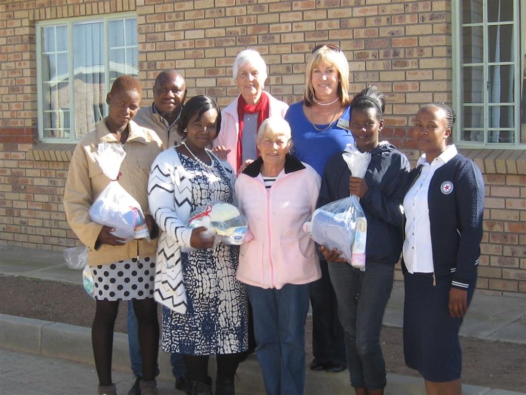 Rotary Club and Unisa Social Work Department handed over birth packs at Ga–Kolopo Village. In the front (from left) is Pontsho Rasekgala (beneficiary), Phuti Kanama (Unisa Student), Marlene Swart (Rotary Club), Ngoakoana Raletjana (beneficiary) and Segale Mmmutlana (Mentor Mother). At the back is Unisa Supervisor Brian Tigere and Rotarians Babbie Wheelwright and Yvonne Joubert. 