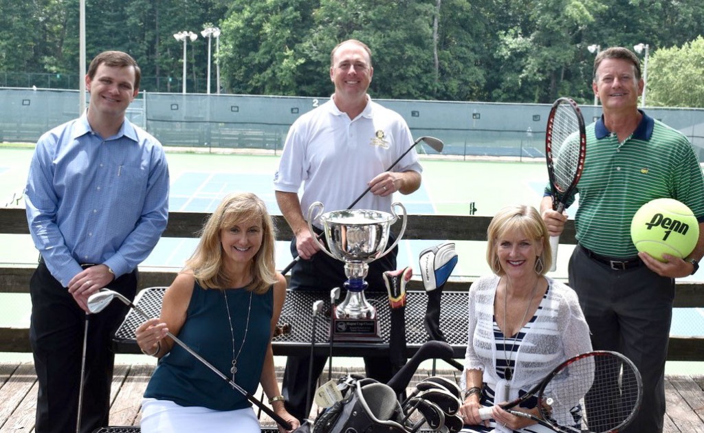 In the bottom row, from left are Lisa Carlisle, president of Roswell Rotary, and Mindy Jones, co-chair of the tennis tournament. In the back row, from left, are golf tournament co-chairs Michael Agurkis and Danny Broadway, and Rich Austin, co-chair of the tennis tournament. Photo: Roswell Rotary