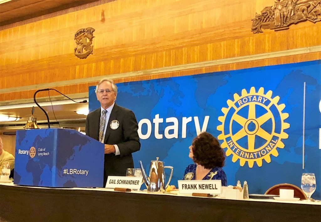 Rotarian Frank Newell talks about Long Beach Rotary's efforts while club president Gail Schwandner listens. Photo: Amy Orr, Gazette