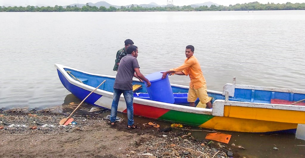 A boat used to ferry a handwash facility to a school defying the floods. 