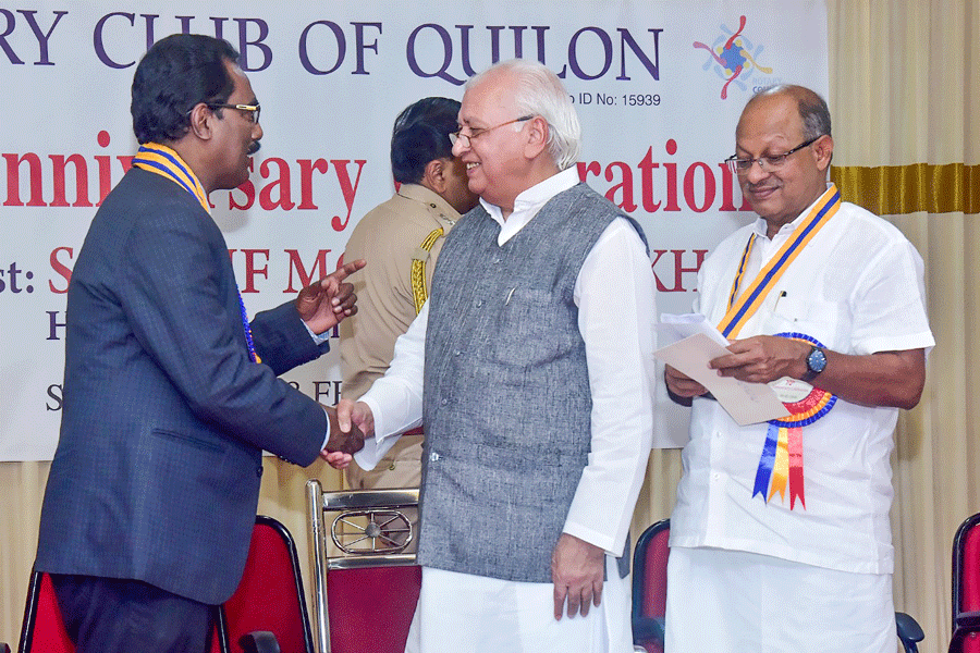 PDG Shirish Kesavan, a member of RC Quilon, is being greeted by Kerala Governor Arif Mohammed Khan at the 70th anniversary celebration.