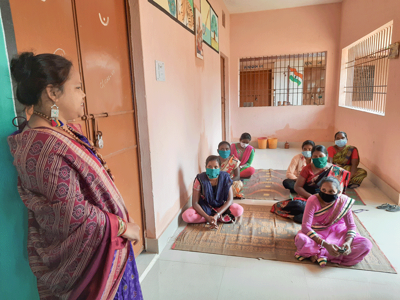 Project co-chair Gouri Nag ­teaching mushroom cultivation to women in Jabapanposh village.