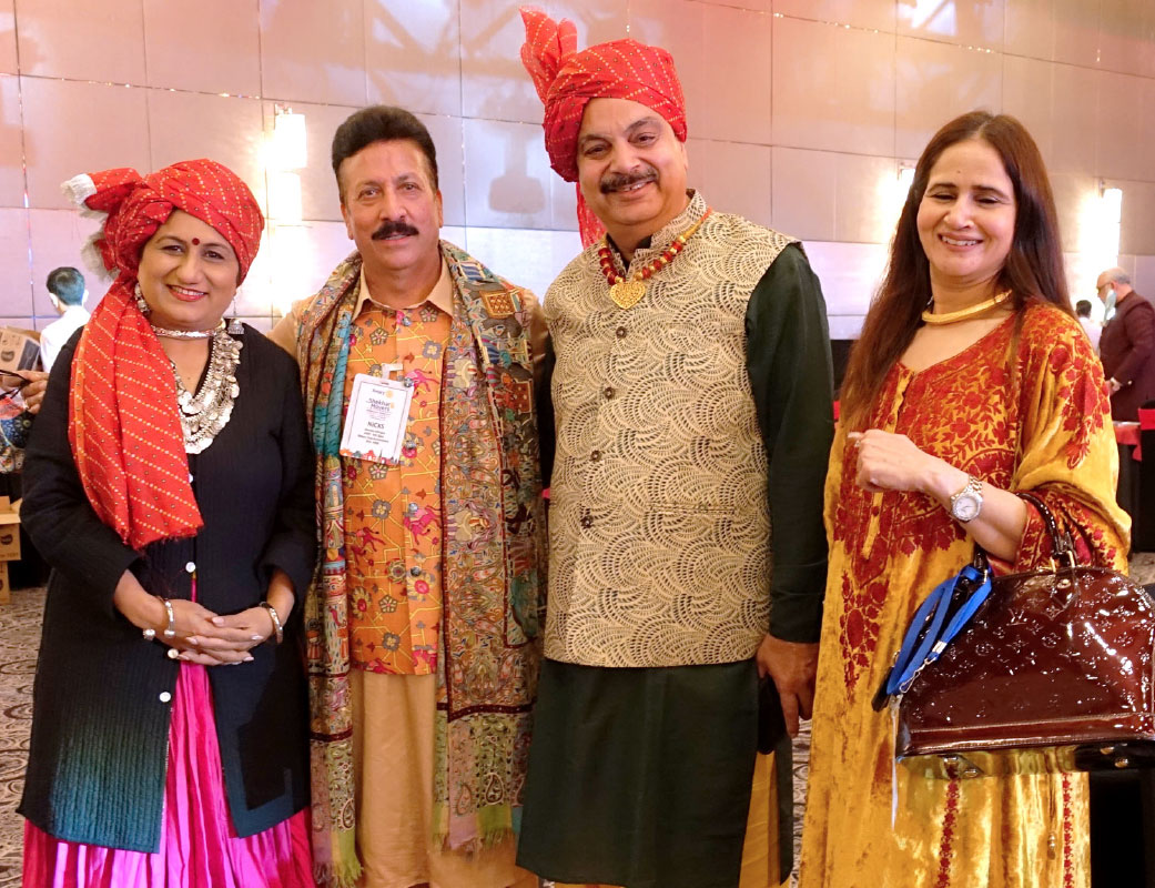PDG Jitendra Dhingra (second from L) and Ritu (R) with DGE Ajay Madan and Savita (3080).
