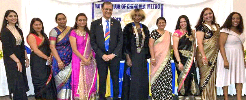 PDG Ravi Devalia and DG Lucie Kasanga with members of RC Chingola Metro.