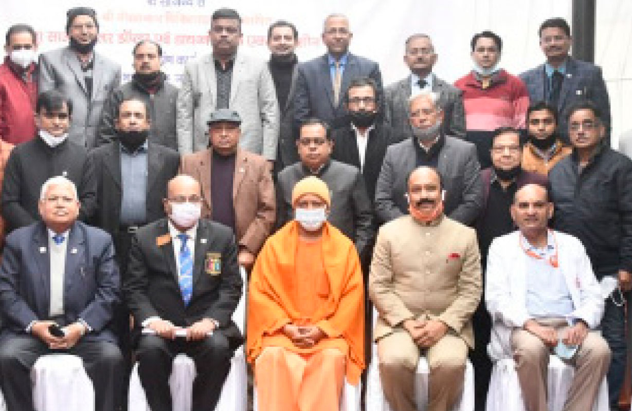 UP CM Yogi Adityanath (centre) with DG Karunesh Kumar Srivastava (second from L) and club members at the Gorakhnath hospital.