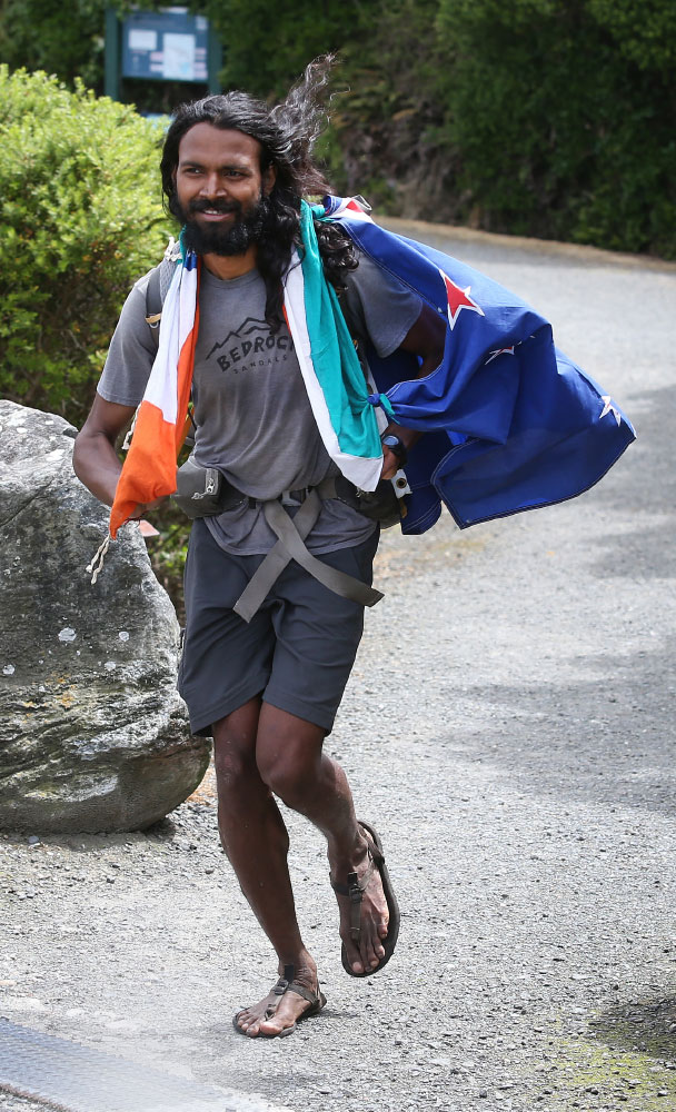 Naresh Kumar approaching the finish line after a 3,300km run in New Zealand.