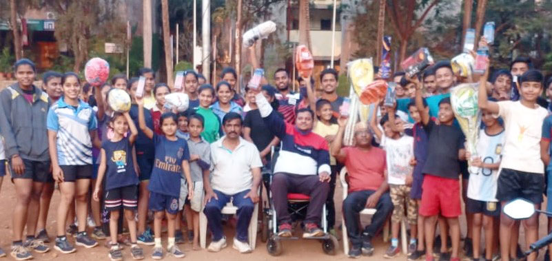 Wheelchair-bound Sagar Khaladkar with his students.