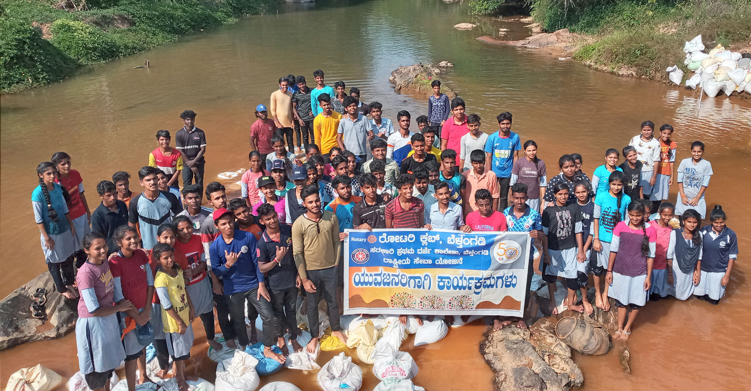Rotaractors, Interactors and RCC members pitch in with Rotarians for building check dams in Belthangady.