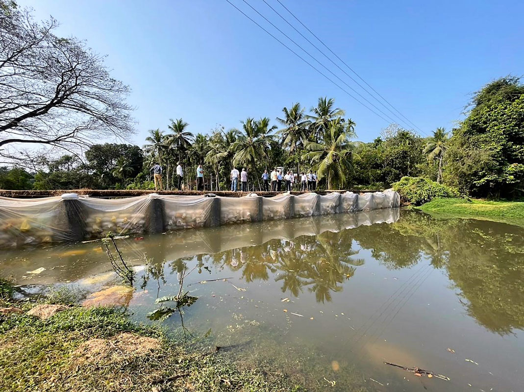 A check dam built with environmental-friendly material across a catchment area.