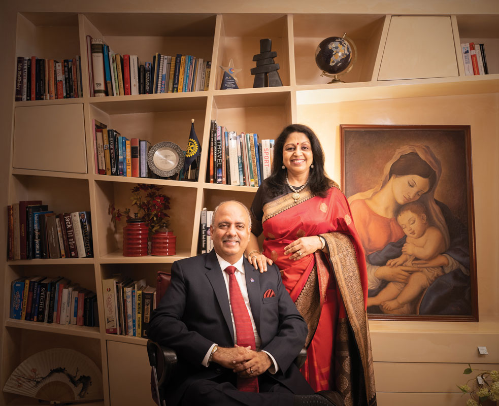 Shekhar and Rashi Mehta at their home in Kolkata. Rashi painted the picture “Mother and Child,” behind her. 