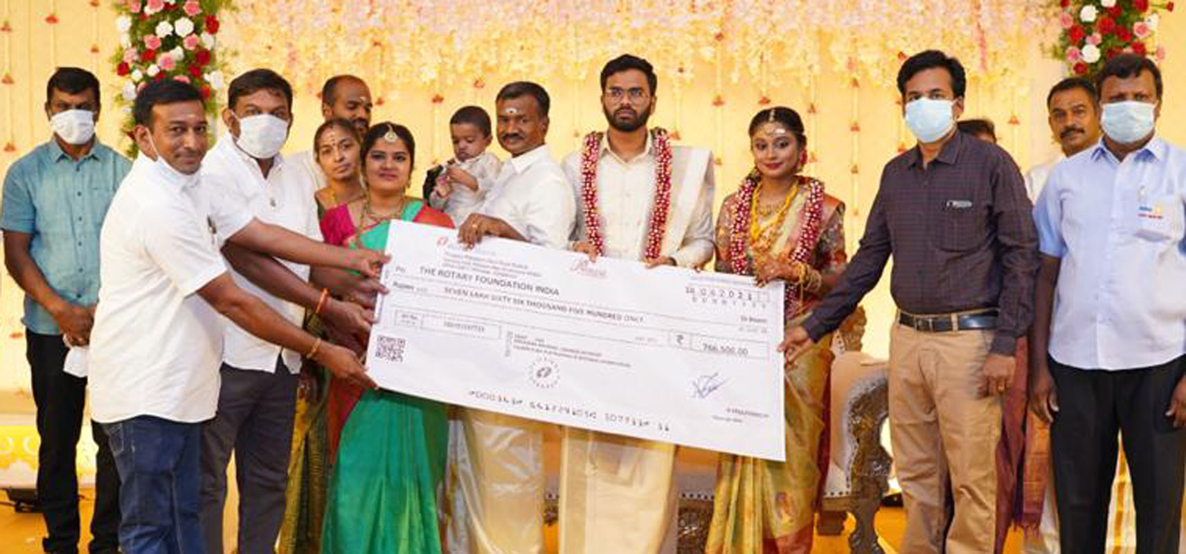 Newly weds Arul Pranesh and Anu donate a portion of their wedding savings to TRF.