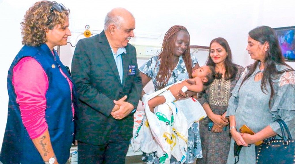 From Left: AG Deepa Goenka, DG Rajendra Agarwal, Lucy Obazwe with her child Emma, Rtn Summan Agrawal and district avenue chair (international surgeries) Leena Shah.