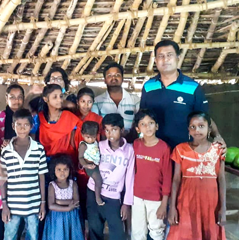 RCCV member Clifford with children at a fishing village near Chennai.