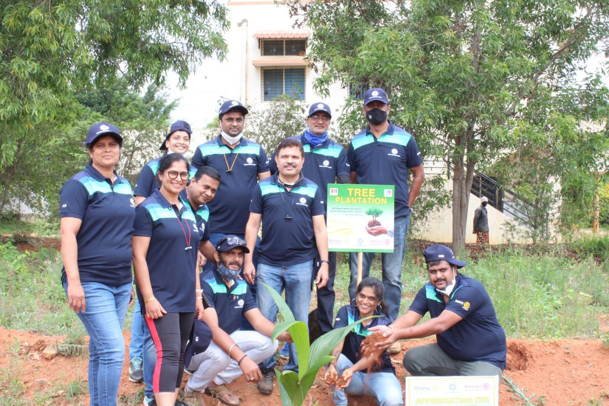 Members of RCC Bangalore Vidyaranyapura, along with its president Mohammed Sikander, planting a sapling.