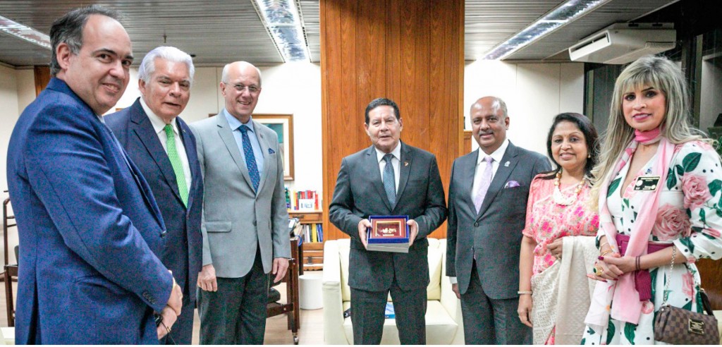 Mehta and Rashi with the Vice-President of Brazil Hamilton Mourao (centre).