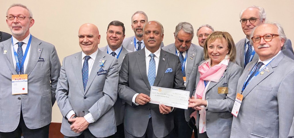 Mehta in Italy where the DGs presented him a cheque for $140,000 for disaster relief for Ukraine.