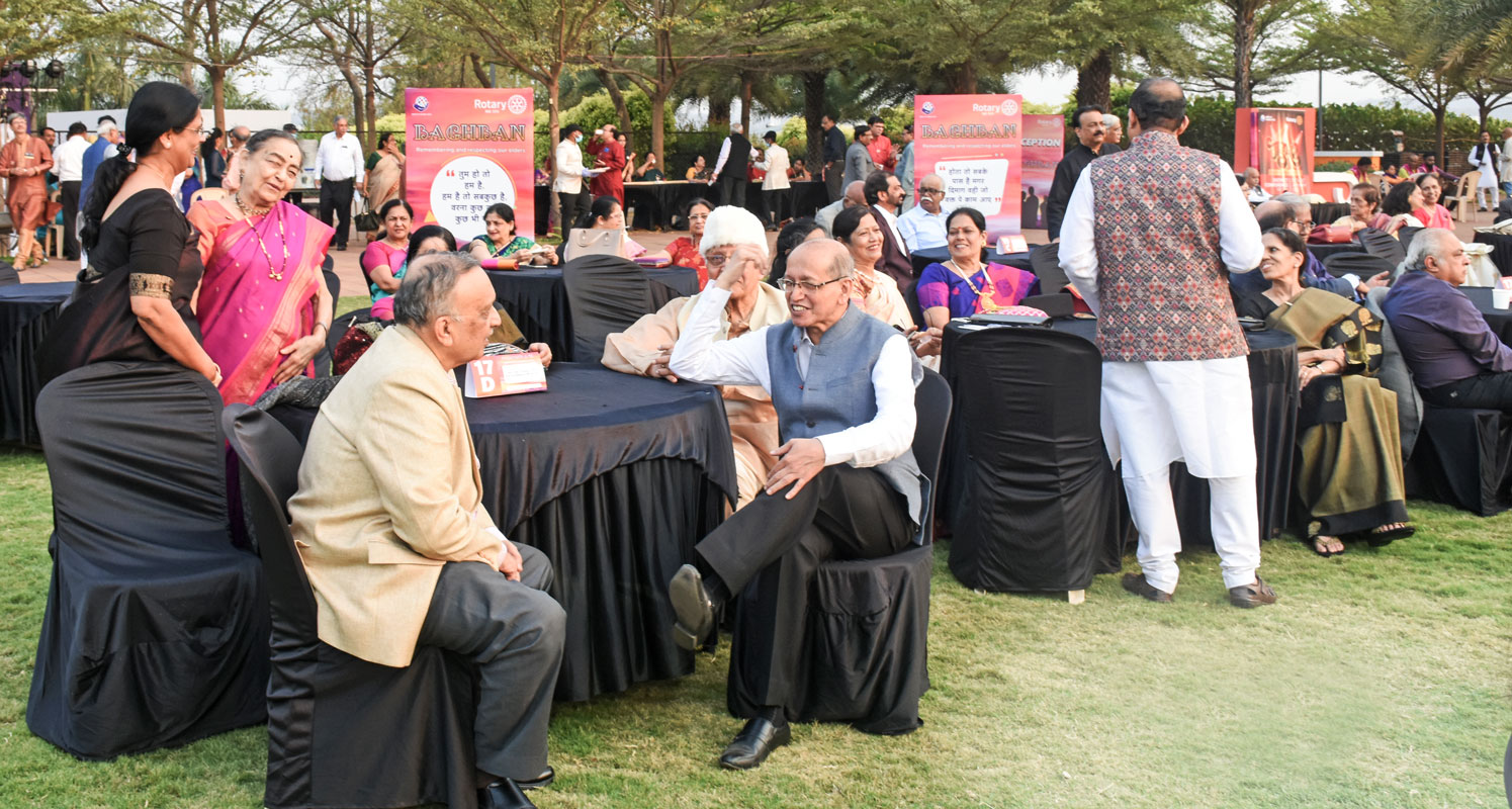 Rotarians interacting with each other at the venue.